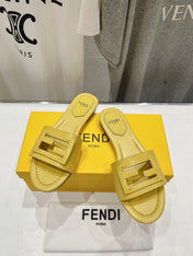 FENDI BAGUETTE SLIDES IN BRIGHT YELLOW LAMBSKIN