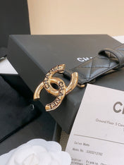 DOUBLE C BELT 30MM IN BLACK QUILTED LAMBSKIN WITH GOLD RESIN BUCKLE ENGRAVED LOGO