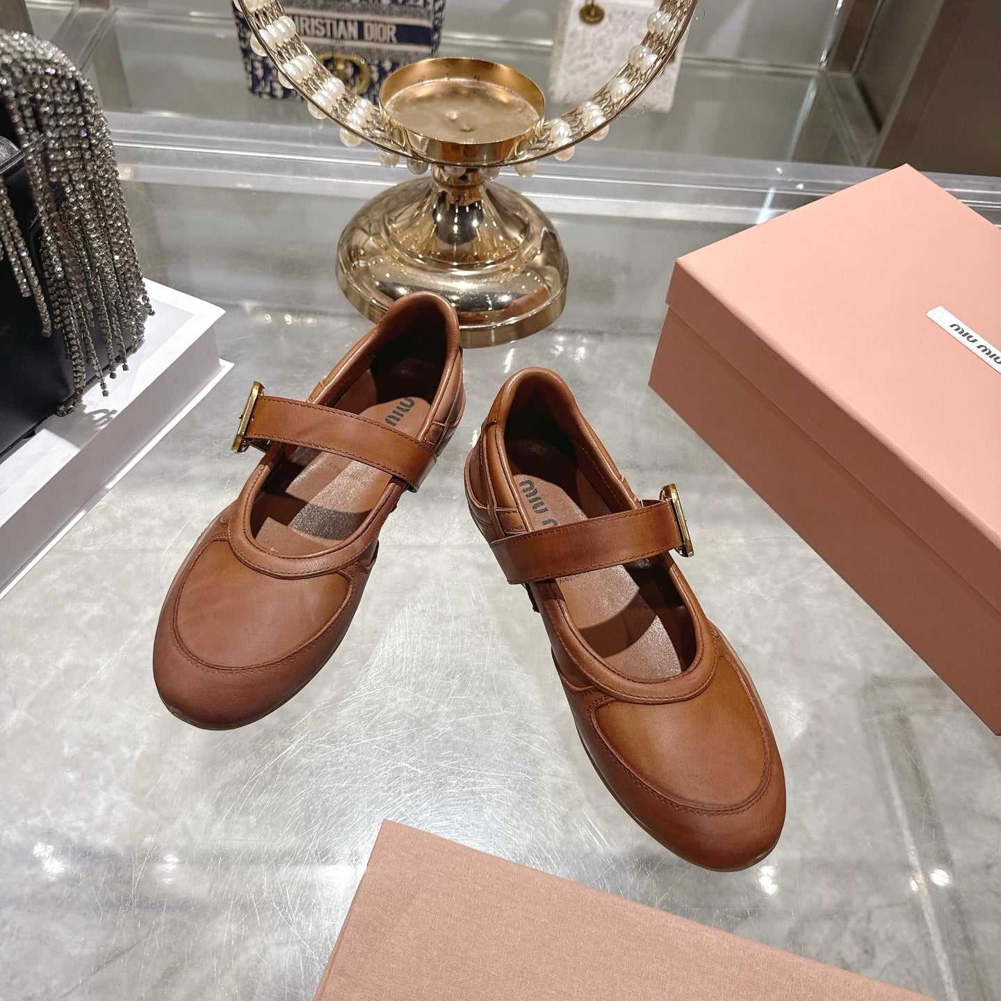 MIUMIU 26S MARY JANE FLATS IN CARAMEL BROWN CALFSKIN GOLD BUCKLE