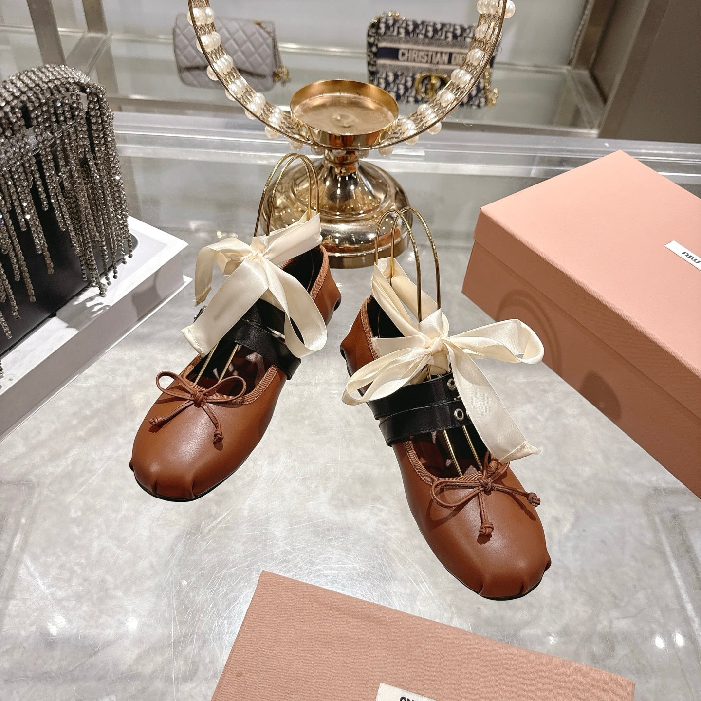 MIUMIU 26S SLINGBACK BALLET FLATS IN CARAMEL BROWN CALFSKIN AND BLACK STRAP RIBBON