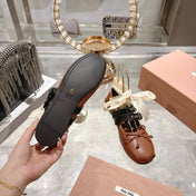 MIUMIU 26S SLINGBACK BALLET FLATS IN CARAMEL BROWN CALFSKIN AND BLACK STRAP RIBBON
