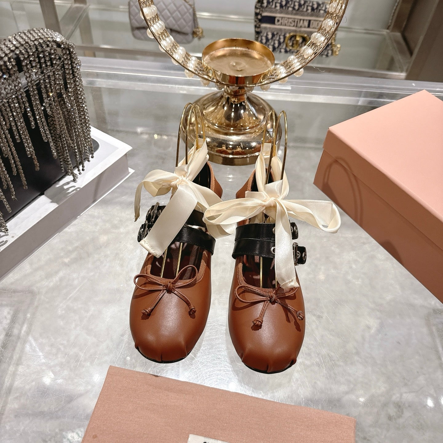 MIUMIU 26S SLINGBACK BALLET FLATS IN CARAMEL BROWN CALFSKIN AND BLACK STRAP RIBBON