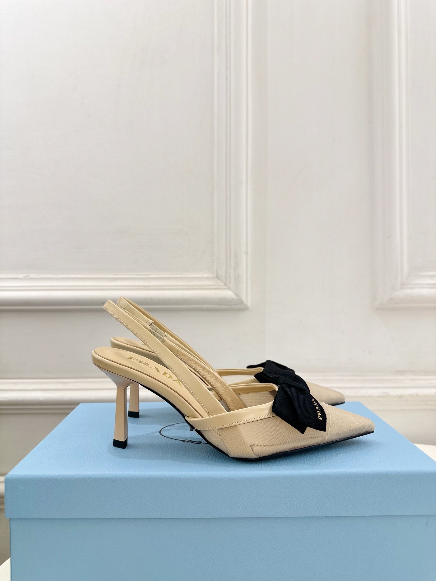 PRADA 26S POINTED-TOE SLINGBACK HEELS 75MM IN BEIGE MESH WITH BLACK BOW