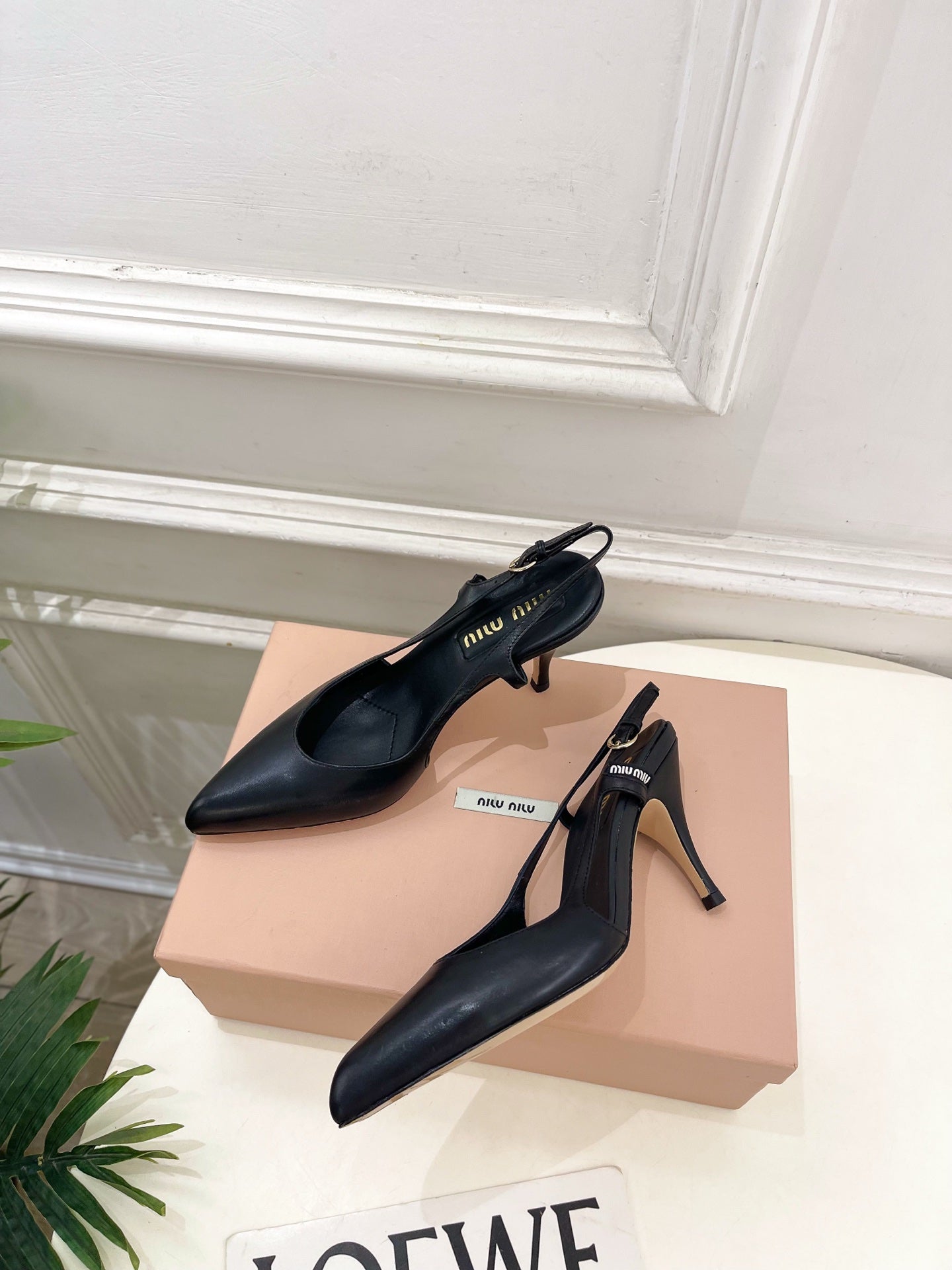MIUMIU 26S SLINGBACK PUMPS 85MM IN BLACK CALFSKIN