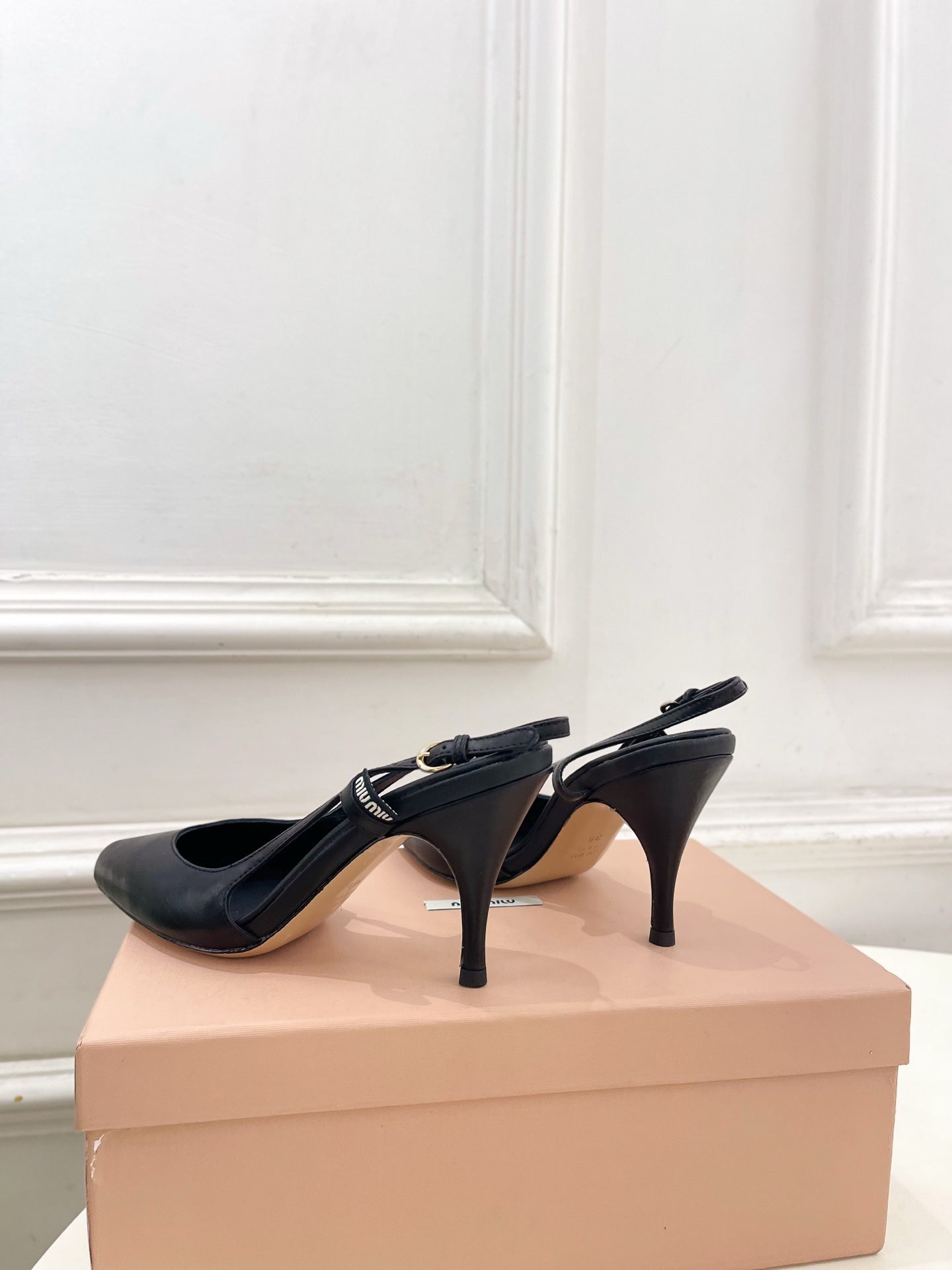 MIUMIU 26S SLINGBACK PUMPS 85MM IN BLACK CALFSKIN