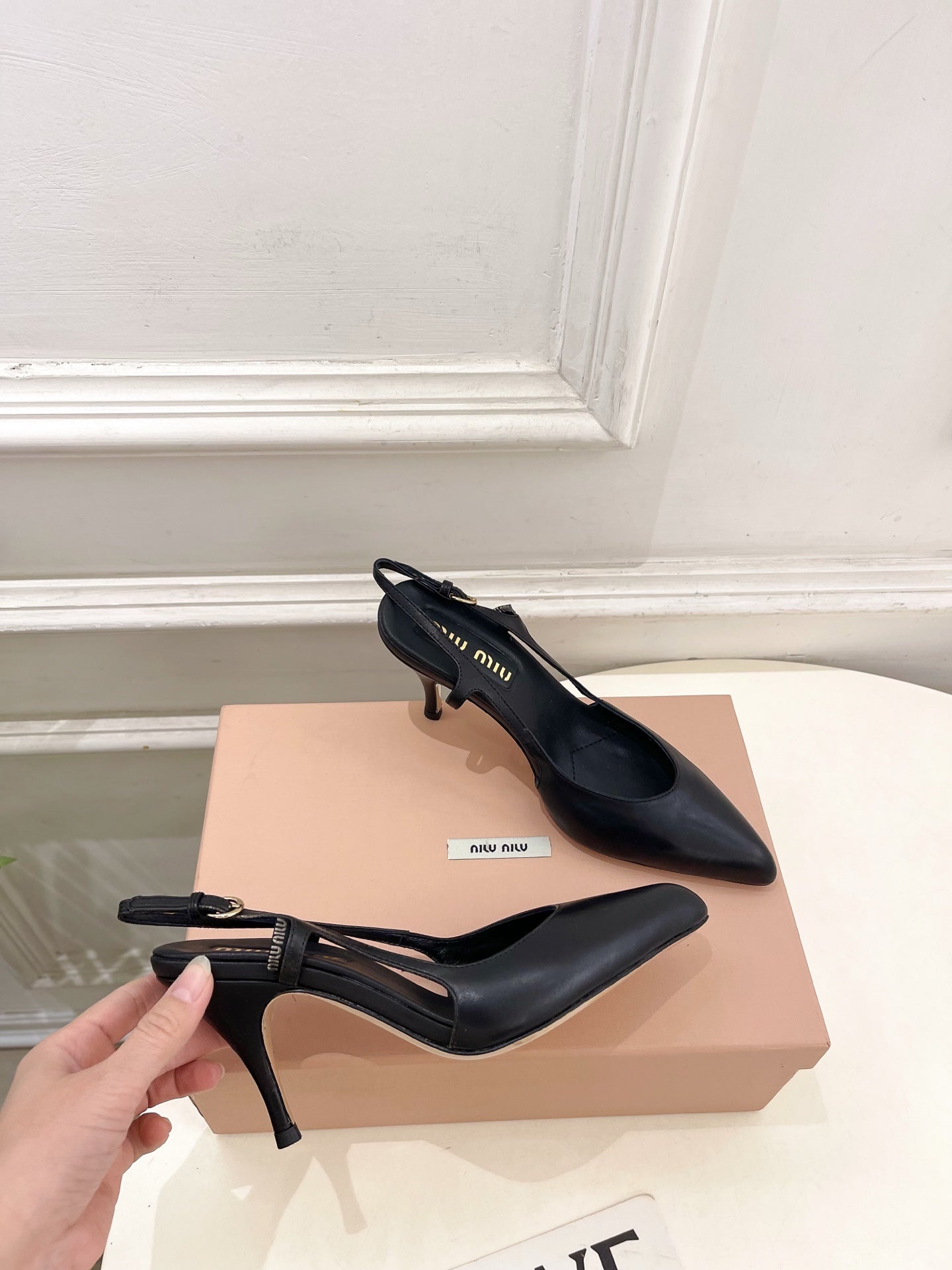 MIUMIU 26S SLINGBACK PUMPS 85MM IN BLACK CALFSKIN