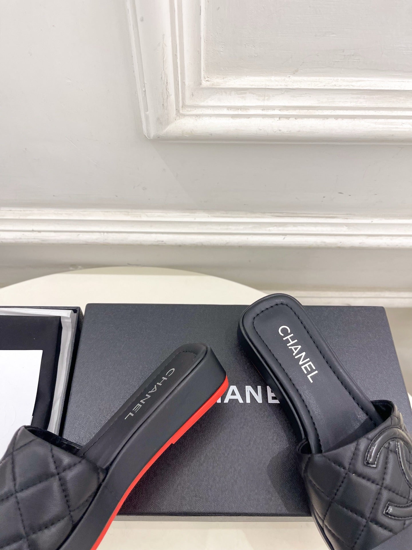 CHANEL 26S FLAT SLIDES IN BLACK LAMBSKIN WITH CC LOGO