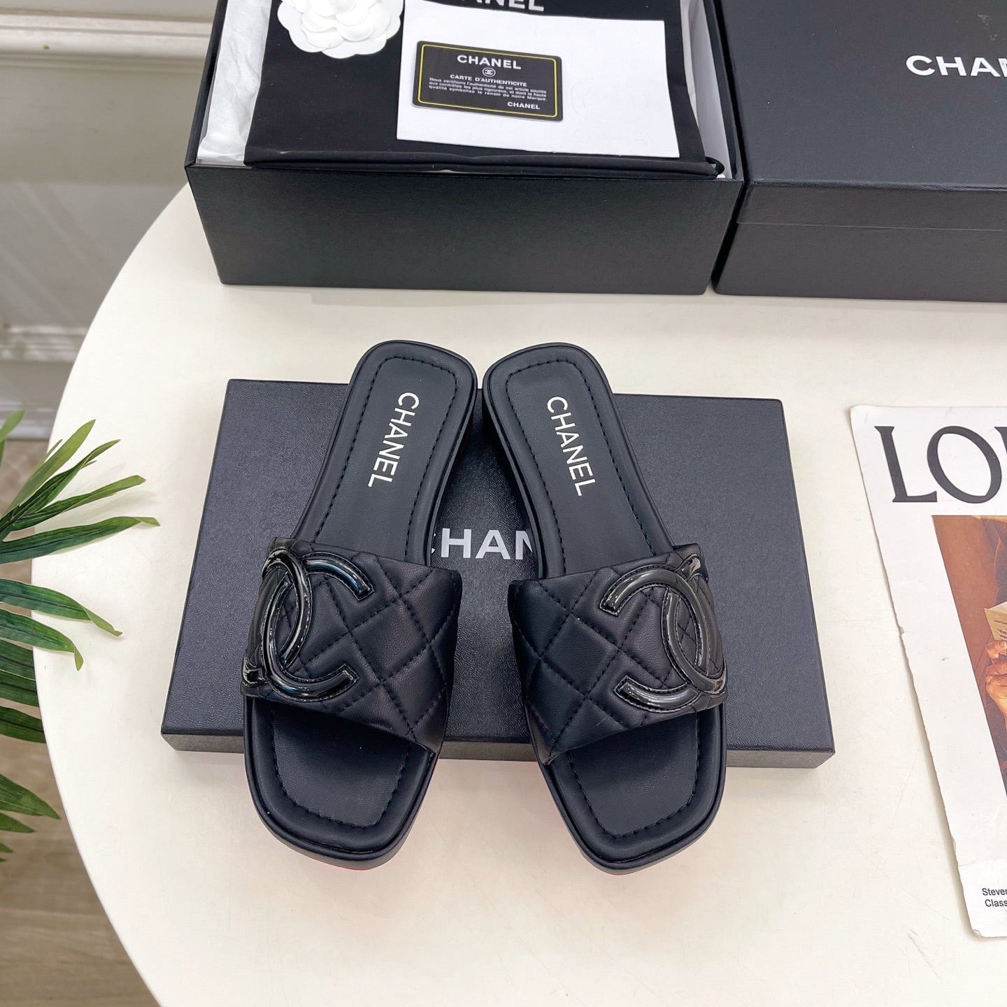 CHANEL 26S FLAT SLIDES IN BLACK LAMBSKIN WITH CC LOGO