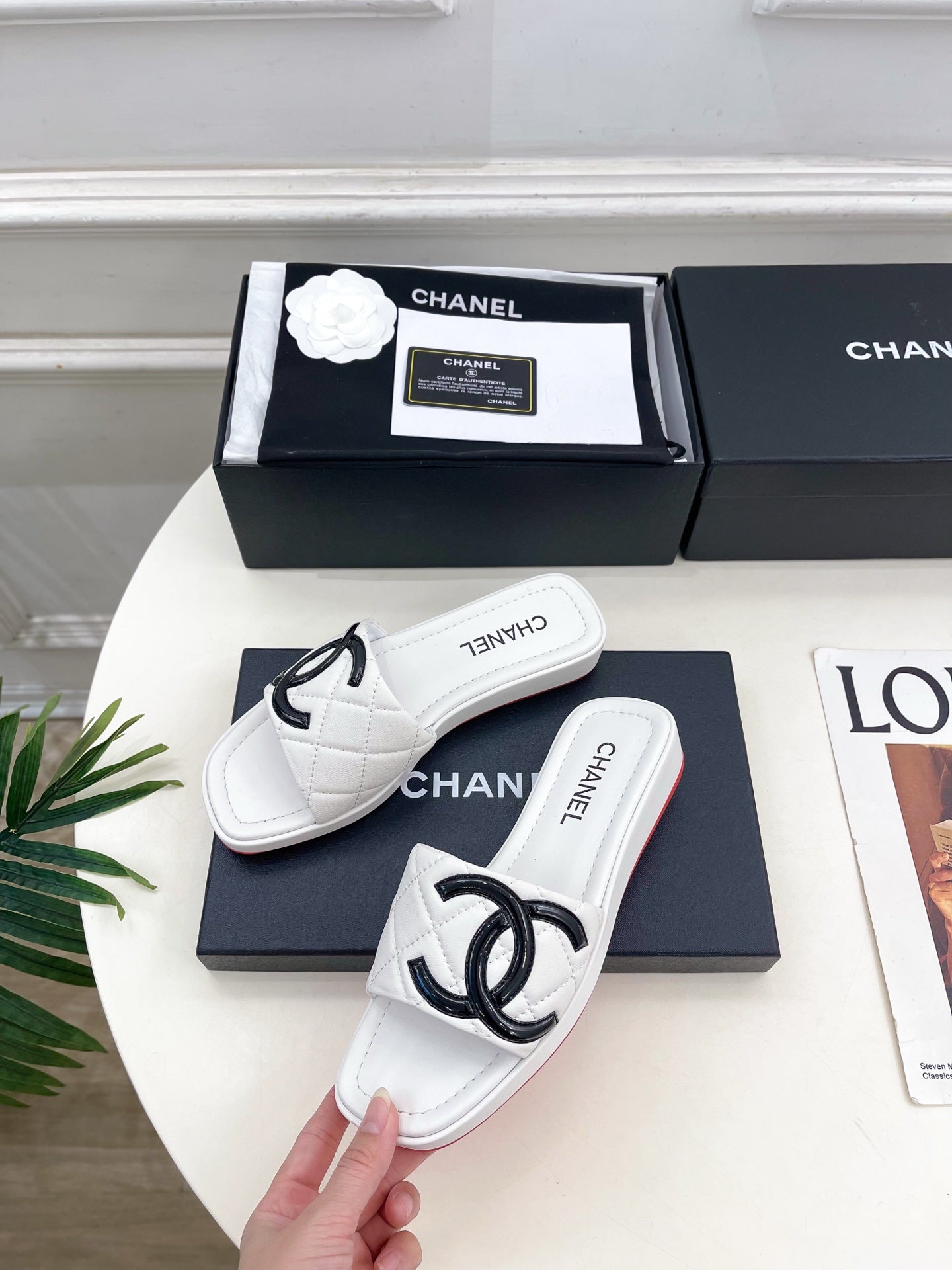 CHANEL 26S FLAT SLIDES IN WHITE LAMBSKIN WITH BLACK CC LOGO