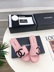 CHANEL 26S FLAT SLIDES IN LIGHT PINK LAMBSKIN WITH BLACK CC LOGO