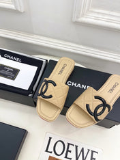 CHANEL 26S FLAT SLIDES IN BEIGE LAMBSKIN WITH BLACK CC LOGO