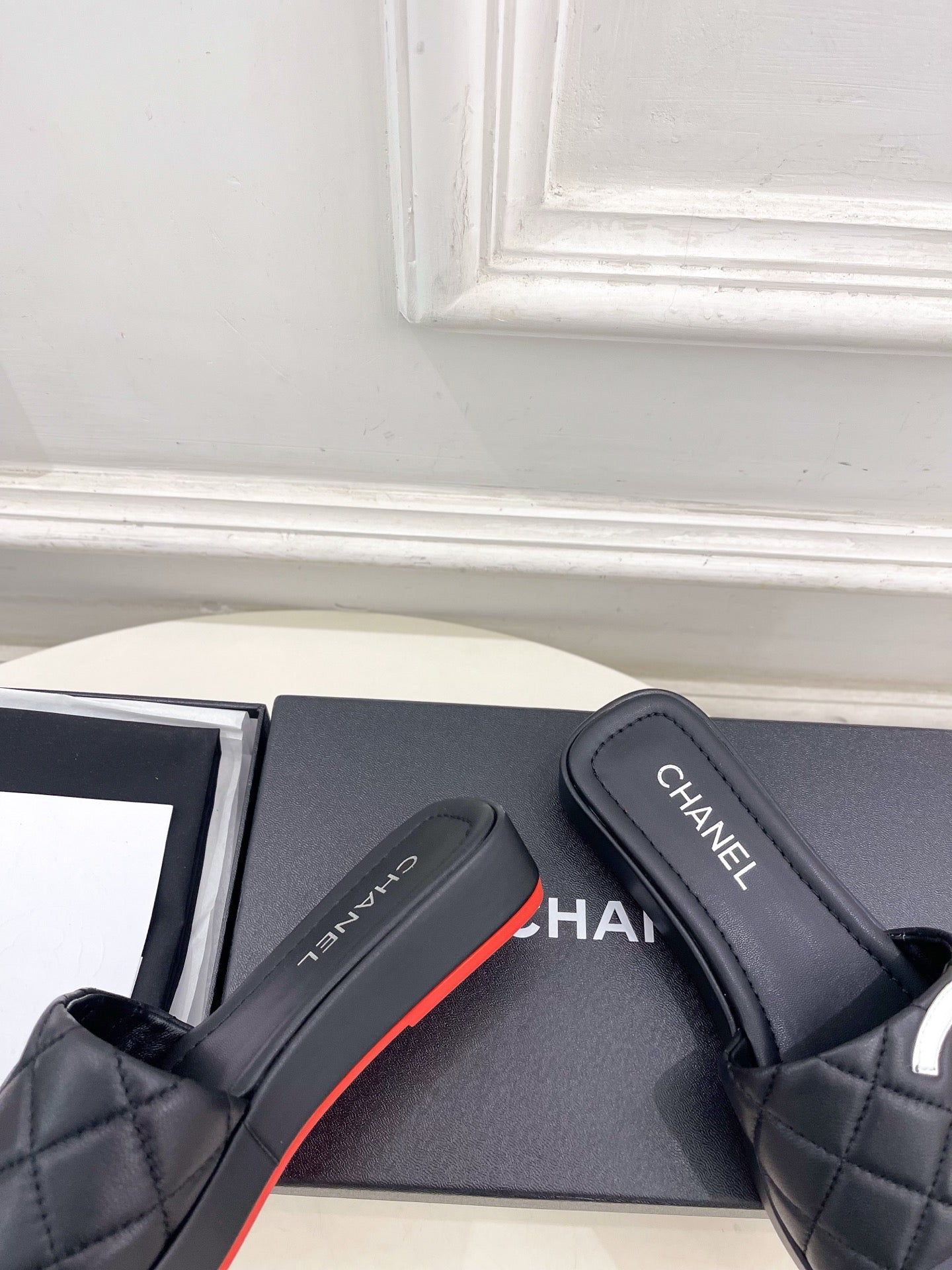 CHANEL 26S FLAT SLIDES IN BLACK LAMBSKIN WITH WHITE CC LOGO
