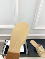 CHANEL 26S FLAT SANDALS IN BEIGE LAMBSKIN CHARM-DECORATED
