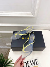 ALAIA 26S POINTED-TOE THONG SANDALS IN YELLOW AND TRANSPARENT PVC