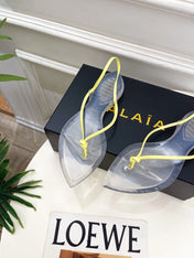 ALAIA 26S POINTED-TOE THONG SANDALS IN YELLOW AND TRANSPARENT PVC