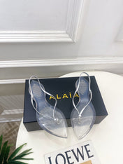 ALAIA 26S POINTED-TOE THONG SANDALS IN SILVER AND TRANSPARENT PVC