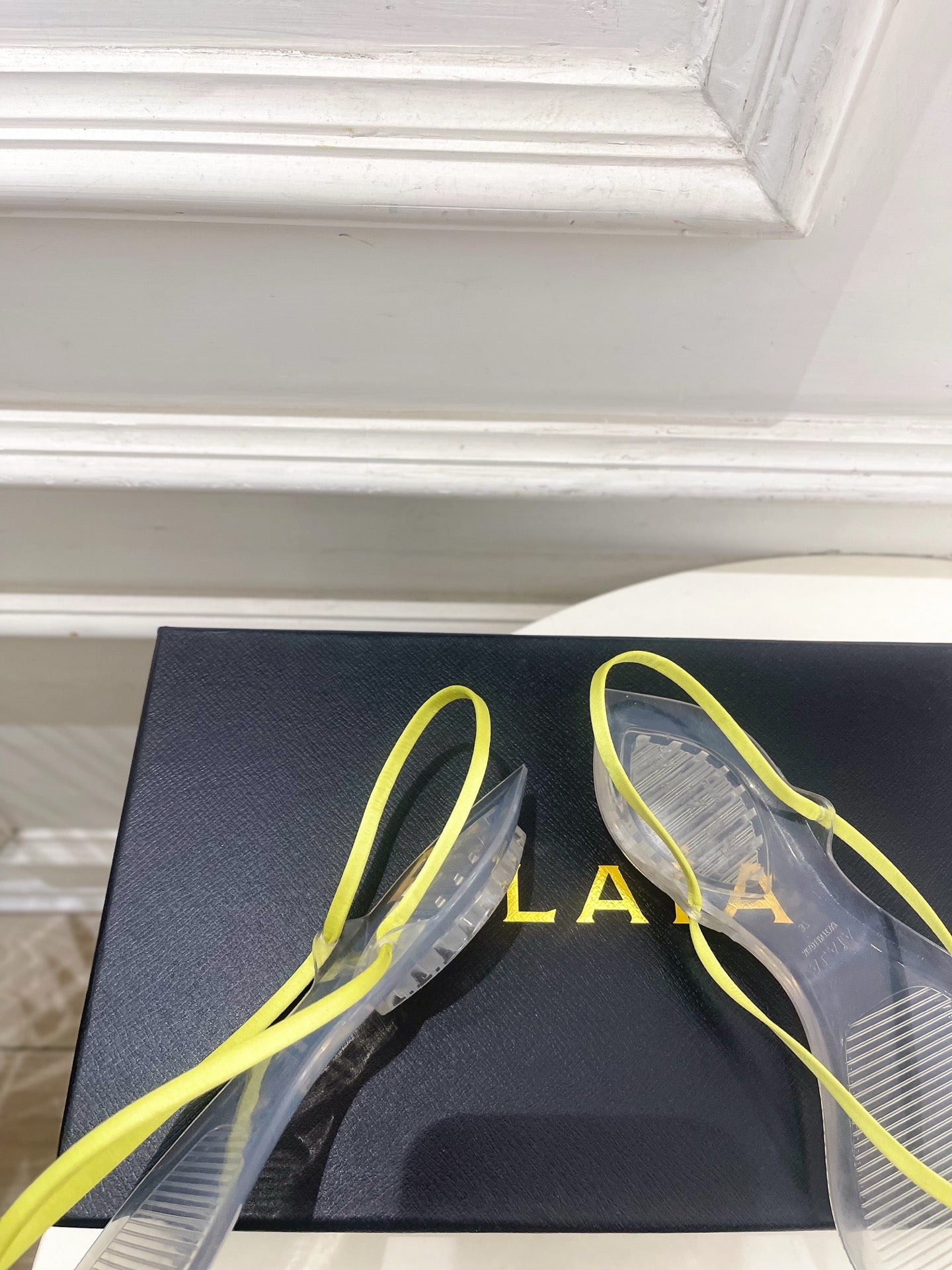 ALAIA 26S POINTED-TOE THONG SANDALS IN LIGHT YELLOW SATIN AND TRANSPARENT PVC