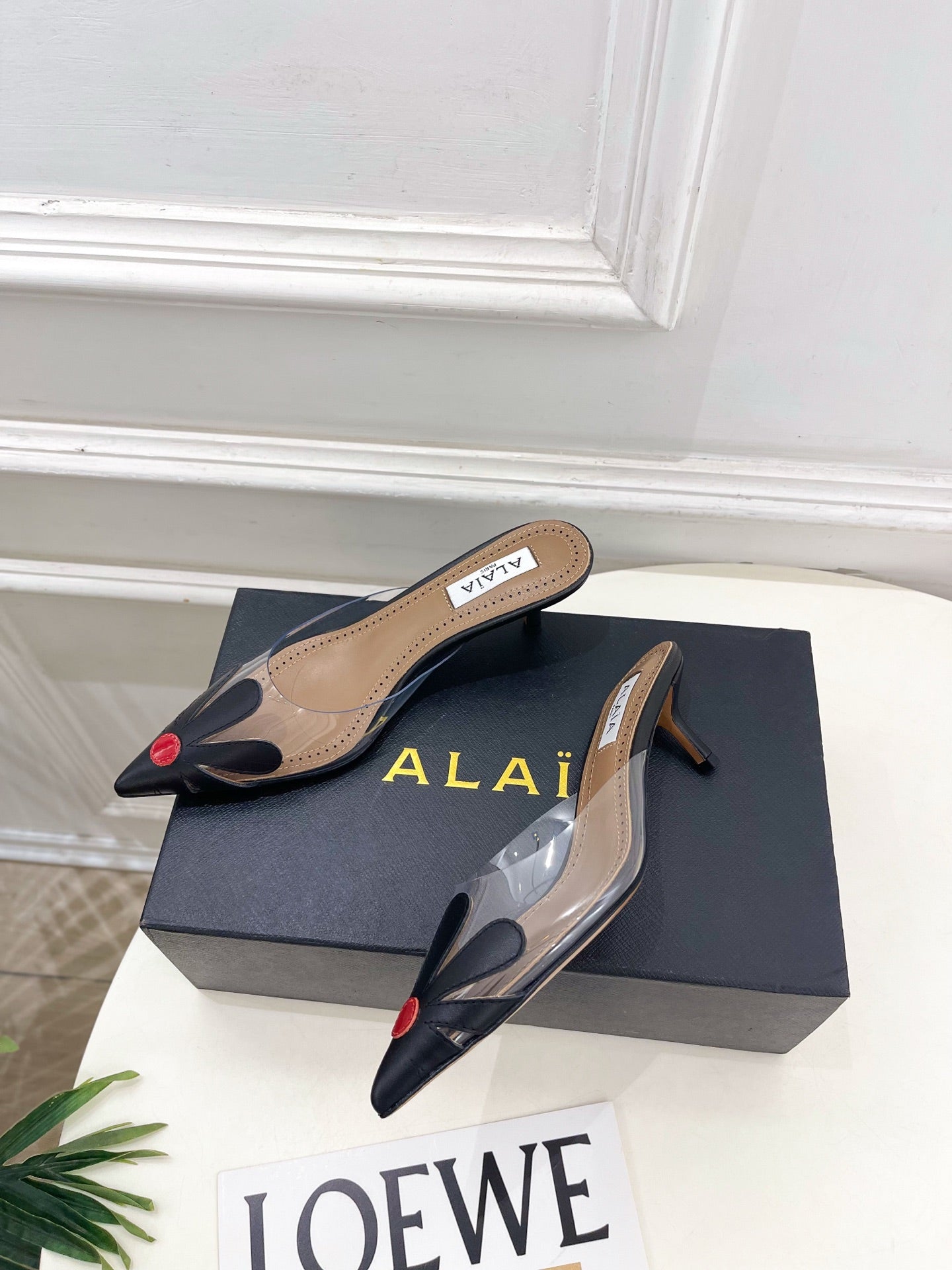 ALAIA 26S MULE HEELS 55 MM IN BLACK LAMBSKIN AND TRANSPARENT PVC