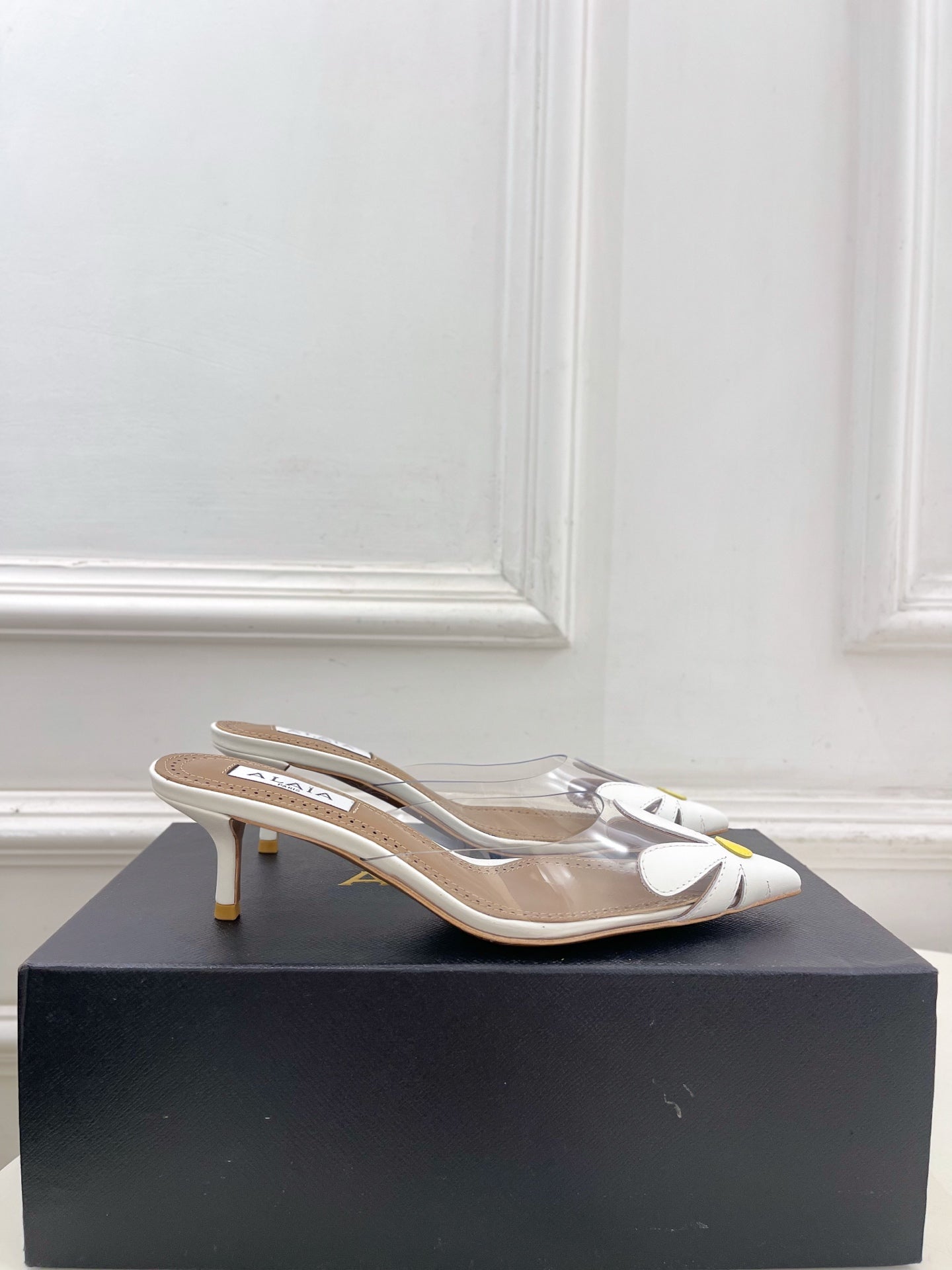 ALAIA 26S MULE HEELS 55 MM IN WHITE LAMBSKIN AND TRANSPARENT PVC