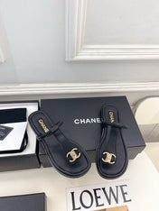 CHANEL 26S THONG SANDALS IN BLACK LAMBSKIN WITH GOLD TONE CC LOGO