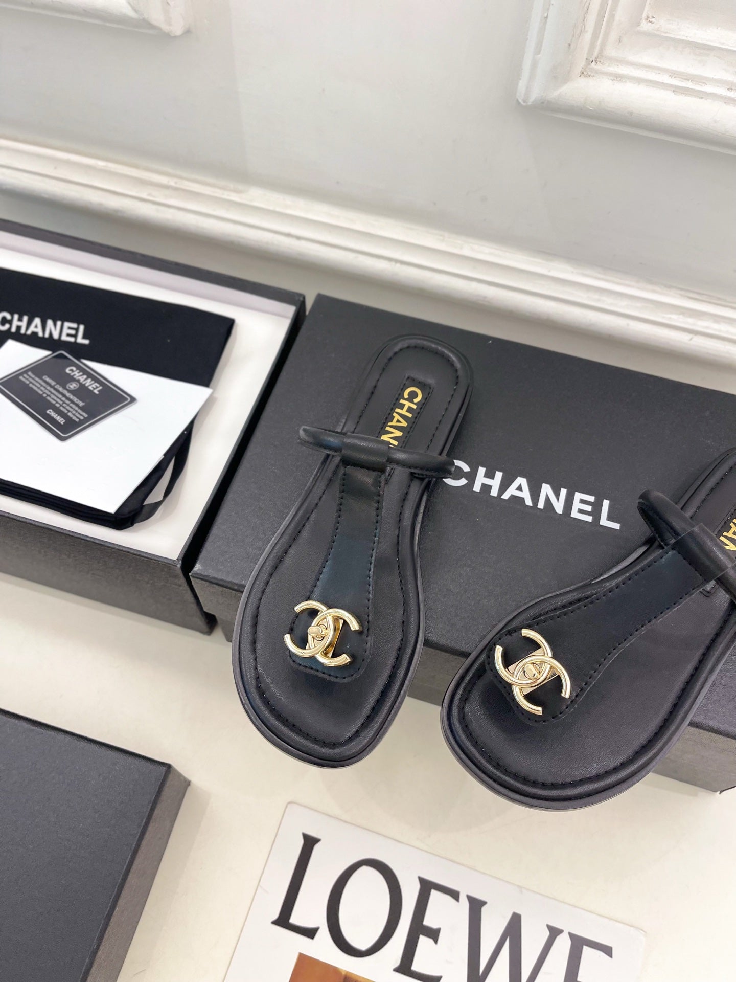 CHANEL 26S THONG SANDALS IN BLACK LAMBSKIN WITH GOLD TONE CC LOGO