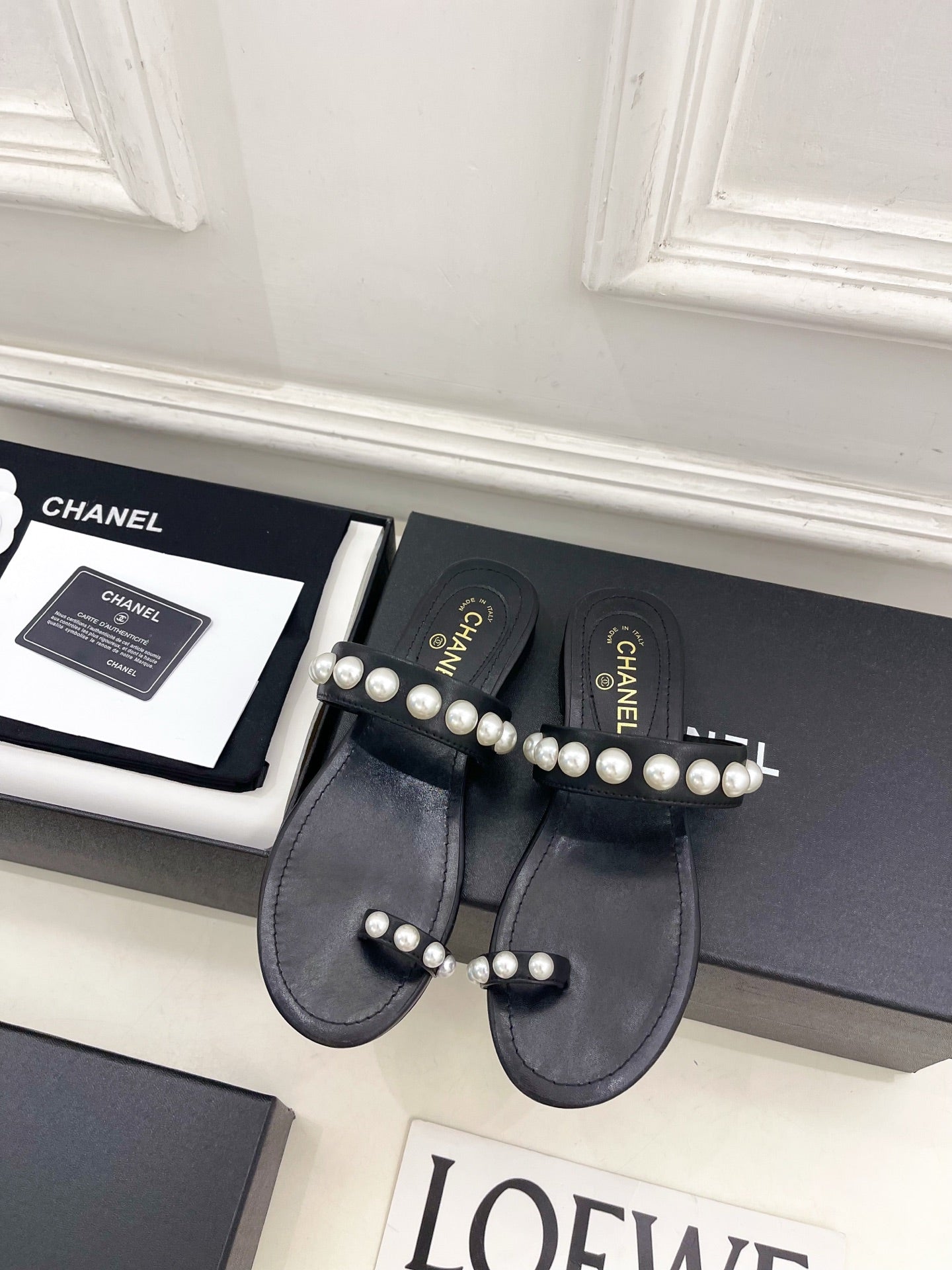 CHANEL 26S THONG SANDALS IN BLACK LAMBSKIN WITH PEARL EMBELLISHMENTS