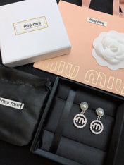 MIUMIU 26S PEARL DROP CRYSTAL LOGO CIRCLE EARRINGS IN SILVER TONE METAL 615772