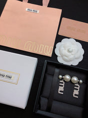 MIUMIU 26S CRYSTAL LOGO PEARL DROP EARRINGS IN SILVER TONE METAL 620414