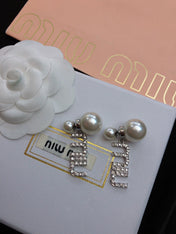MIUMIU 26S CRYSTAL LOGO PEARL DROP EARRINGS IN SILVER TONE METAL 620414