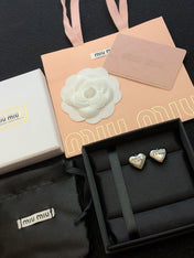 MIUMIU 26S HEART LOGO STUD EARRINGS WITH PEARL DETAILS IN SILVER TONE METAL 630844