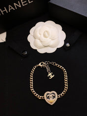 CHANEL 26S DOUBLE C LOGO PAVE CRYSTAL HEART CHAIN BRACELET IN GOLD METAL 633321