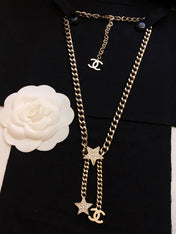 CHANEL 26S CHANEL CC LOGO DOUBLE CHAIN STAR DROP NECKLACE IN GOLD METAL 633324