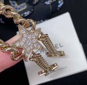 CHANEL 26S CHANEL CC LOGO DOUBLE CHAIN STAR DROP NECKLACE IN GOLD METAL 633324