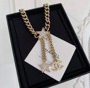 CHANEL 26S CHANEL CC LOGO DOUBLE CHAIN STAR DROP NECKLACE IN GOLD METAL 633324