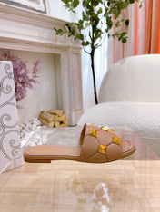 STUD FLAT SLIDE IN PEANUT BROWN LAMBSKIN