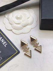 CHANEL 26S DOUBLE C LOGO TWO-TONE CRYSTAL TRIANGLE DROP EARRINGS IN GOLD METAL 631834